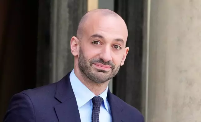 FILE - French Deputy minister in charge of European Affairs Benjamin Haddad leaves the weekly cabinet meeting, Tuesday, Oct. 14, 2025 at the Elysee Palace in Paris. (AP Photo/Michel Euler, File)