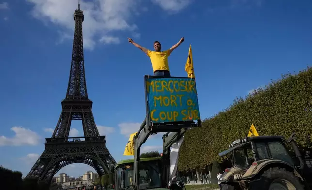 FILE - French farmers protest against the Mercosur trade alliance with South America countries, Tuesday, Oct. 14, 2025 near the Eiffel Tower in Paris. (AP Photo/Michel Euler, File)