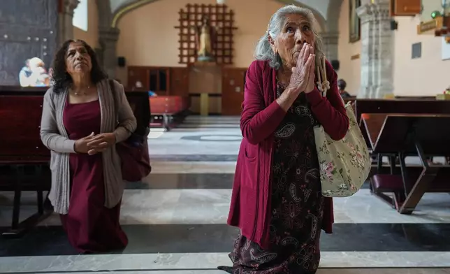 Teresa Morales prays in the Old Basilica of Our Lady of Guadalupe in Mexico City, Wednesday, Nov. 26, 2025. (AP Photo/Claudia Rosel)