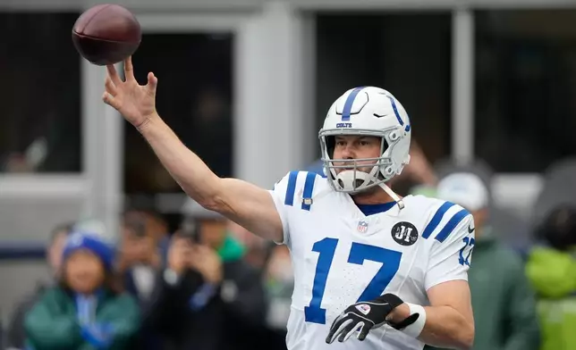 Indianapolis Colts quarterback Philip Rivers warms up before an NFL football game against the Seattle Seahawks, Sunday, Dec. 14, 2025, in Seattle. (AP Photo/Stephen Brashear)