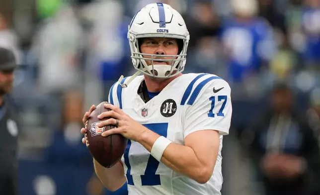 Indianapolis Colts quarterback Philip Rivers warms up before an NFL football game against the Seattle Seahawks, Sunday, Dec. 14, 2025, in Seattle. (AP Photo/Stephen Brashear)