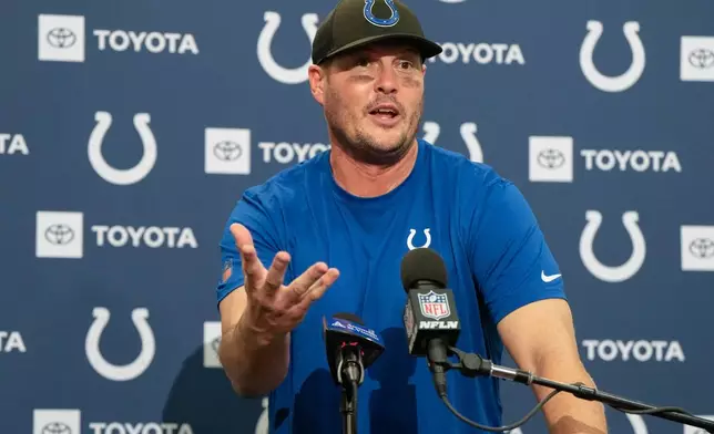 Indianapolis Colts quarterback Philip Rivers speaks during a news conference after an NFL football game against the Seattle Seahawks, Sunday, Dec. 14, 2025, in Seattle. (AP Photo/Stephen Brashear)
