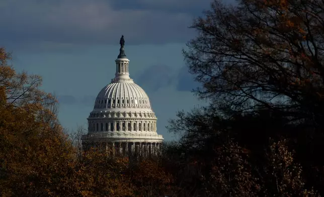 The U.S. Capitol is seen from the base of the Washington Monument, Friday, Nov. 28, 2025, in Washington. (AP Photo/Julia Demaree Nikhinson)