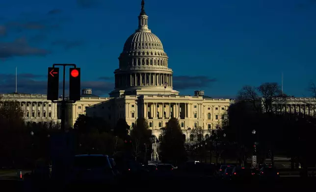 The U.S. Capitol is seen shortly before sunset, Friday, Nov. 28, 2025, in Washington. (AP Photo/Julia Demaree Nikhinson)