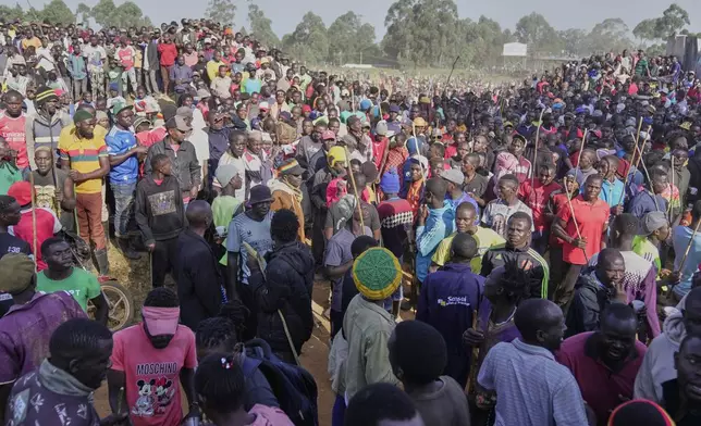 Spectators attend a bullfighting match, in Kakamega, Kenya, Saturday, Nov. 29, 2025. (AP Photo/Brian Inganga)