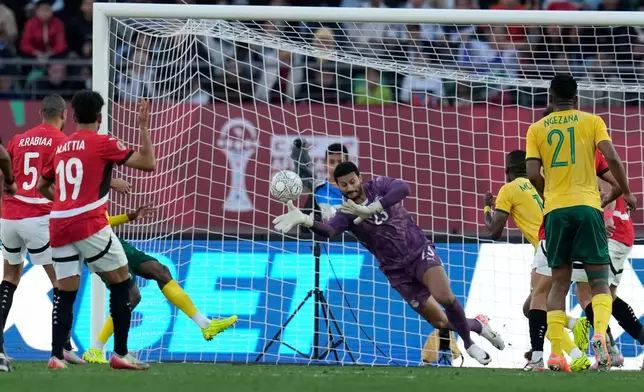 Egypt's goalkeeper Mohamed Sobhy clears the ball during the Africa Cup of Nations group B soccer match between Egypt and South Africa in Agadir, Morocco, Friday, Dec. 26, 2025. (AP Photo/Themba Hadebe)