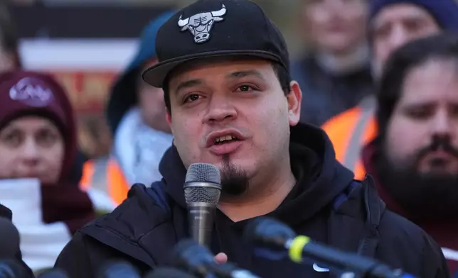 Kilmar Abrego Garcia speaks during a rally ahead of a mandatory check at the Immigration and Customs Enforcement office in Baltimore, Friday, Dec. 12, 2025, after he was released from detention on Thursday under a judge's order. (AP Photo/Stephanie Scarbrough)
