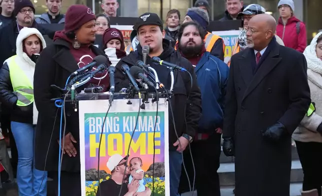Kilmar Abrego Garcia speaks at a rally before a mandatory check at the Immigration and Customs Enforcement office in Baltimore, Friday, Dec. 12, 2025, after he was released from detention on Thursday under a judge's order. (AP Photo/Stephanie Scarbrough)