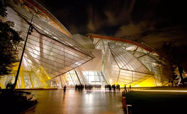 FILE - The Louis Vuitton Foundation art museum and cultural center, created by American architect Frank Gehry, is photographed during the inauguration of the Gehry latest creation in Paris, Monday, Oct. 20, 2014. (AP Photo/Jacques Brinon, File)