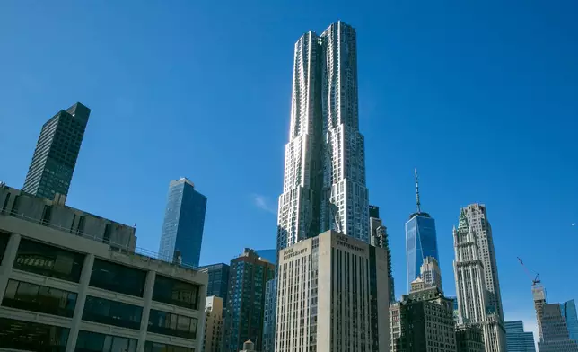 FILE - 8 Spruce Street residential skyscraper is in the Financial District in lower Manhattan, Monday, Feb. 13, 2023, in New York. (AP Photo/Ted Shaffrey, File)