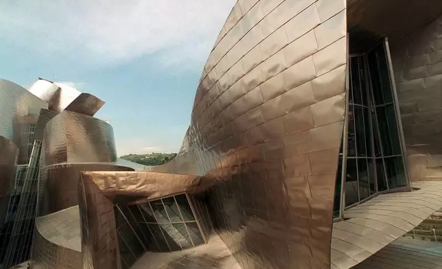 FILE - Curves and angles mix in this section of the new Guggenheim Museum designed by American architect Frank Gehry, in Bilbao, Spain, Sept. 24, 1997. (AP Photo/Javier Bauluz, File)