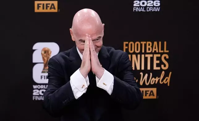 FIFA President Gianni Infantino arrives to attend the draw for the 2026 soccer World Cup at the Kennedy Center in Washington, Friday, Dec. 5, 2025. (AP Photo/Julia Demaree Nikhinson)