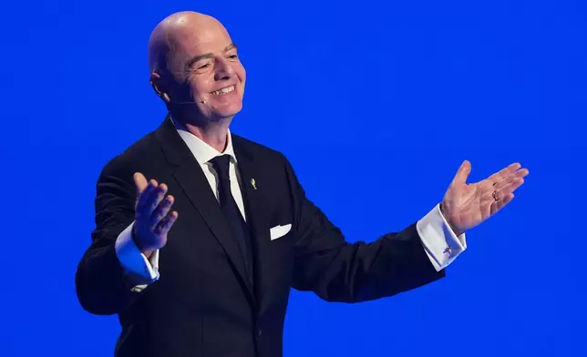 FIFA President Gianni Infantino speaks during the draw for the 2026 soccer World Cup at the Kennedy Center in Washington, Friday, Dec. 5, 2025. (AP Photo/Stephanie Scarbrough, Pool)