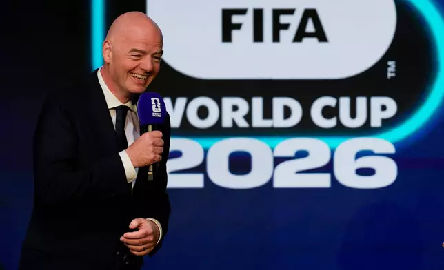 FIFA President Gianni Infantino speaks during the match schedule reveal for the 2026 soccer World Cup in Washington, Saturday, Dec. 6, 2025. (AP Photo/Chris Carlson)