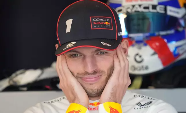 Red Bull driver Max Verstappen of the Netherlands gets ready for the first practice for the he Abu Dhabi Formula One Grand Prix in Abu Dhabi, United Arab Emirates, Friday, Dec. 5, 2025. (AP Photo/Darko Bandic)