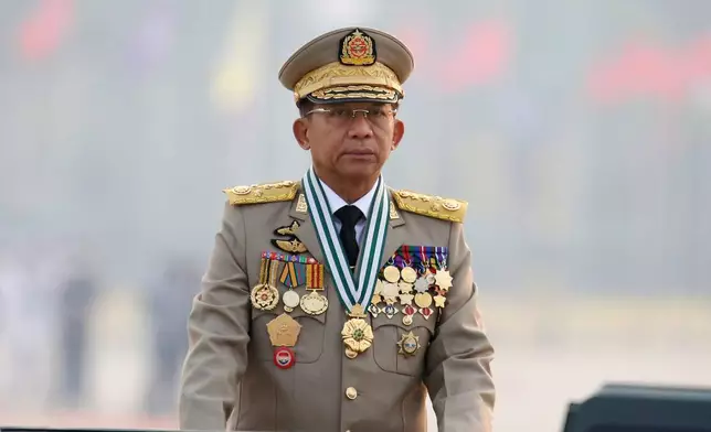 FILE - Myanmar's Commander-in-Chief Senior General Min Aung Hlaing presides an army parade on Armed Forces Day in Naypyitaw, Myanmar, March 27, 2021. (AP Photo, File)
