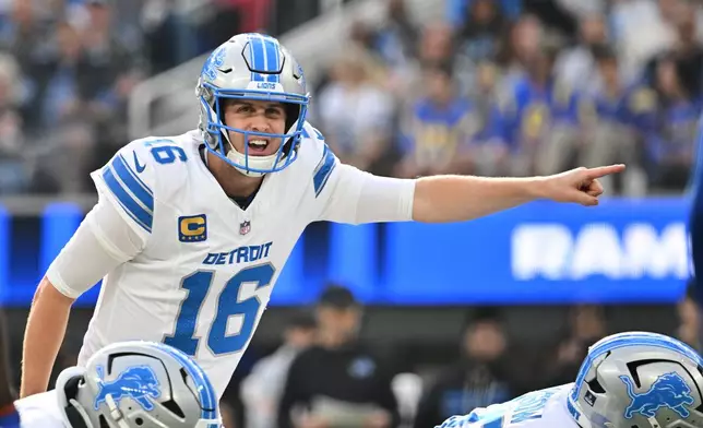 Detroit Lions quarterback Jared Goff (16) calls a play during the first half of an NFL football game against the Detroit Lions, Sunday, Dec. 14, 2025, in Inglewood, Calif. (AP Photo/Katie Chin)