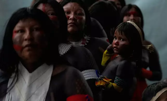 Indigenous people attend the opening ceremony of the People's Summit offsite from the COP30 U.N. Climate Summit in Belem, Brazil, Nov. 12, 2025. (AP Photo/Fernando Llano, File)
