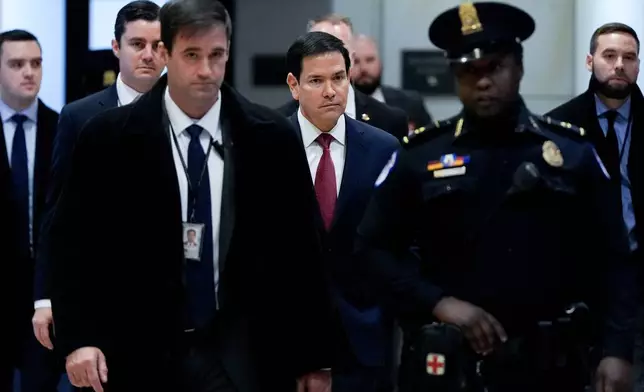 Secretary of State Marco Rubio arrives to brief members of Congress on military strikes near Venezuela, Tuesday, Dec. 16, 2025, at the Capitol in Washington. (AP Photo/Julia Demaree Nikhinson)