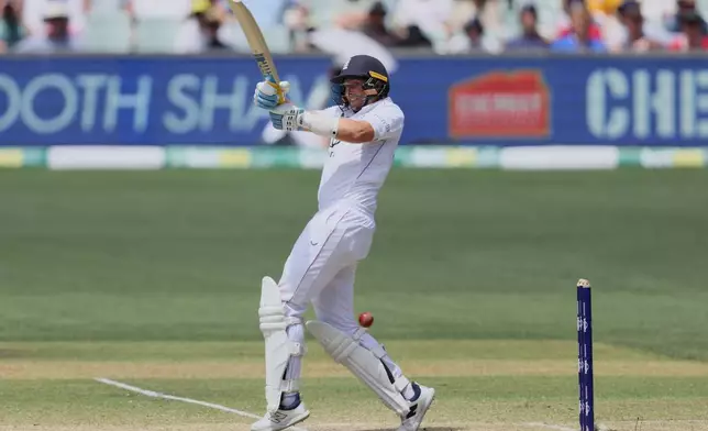 England's Joe Root bats during play on day four of the third Ashes cricket test between England and Australia in Adelaide, Australia, Saturday, Dec. 20, 2025. (AP Photo/James Elsby)