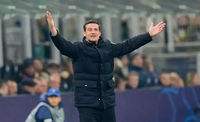 Inter Milan's head coach Cristian Chivu gestures during a Champions League, league phase, soccer match between Inter Milan and Liverpool in Milan, Italy, Tuesday, Dec.9, 2025. (AP Photo/Luca Bruno)