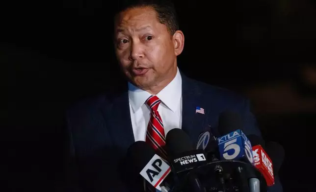 LAPD Deputy Chief Alan Hamilton speaks near Rob Reiner's residence Sunday, Dec. 14, 2025, in the Brentwood section of Los Angeles. (AP Photo/Ethan Swope)