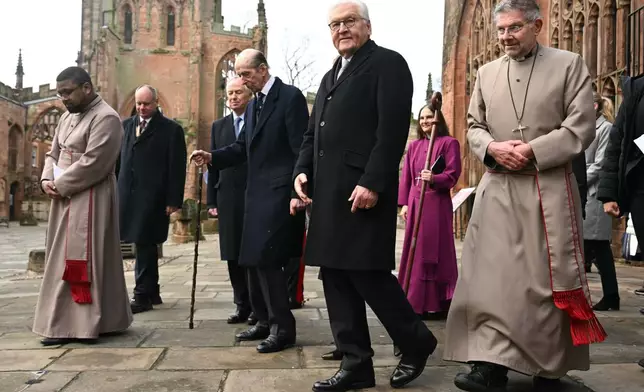 Britain's Duke of Kent, third right, and Germany's President Frank-Walter Steinmeier, second right, tour the ruins of the old Cathedral in Coventry, Coventry Cathedral, in Coventry, England, Friday, Dec. 5, 2025, on the final day of the state visit to the UK. (Oli Scarff/Pool Photo via AP)