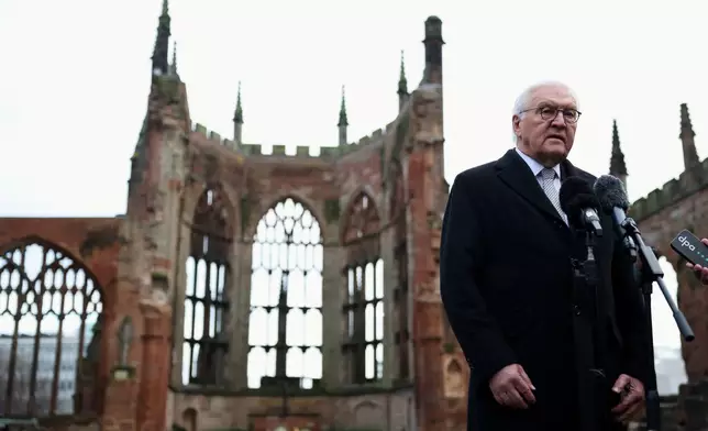 Germany's President Frank-Walter Steinmeier speaks to the media on the grounds of the old Coventry Cathedral, in Coventry, England, Friday, Dec. 5, 2025, on the final day of the state visit to the UK. (Hannah McKay/Pool Photo via AP)