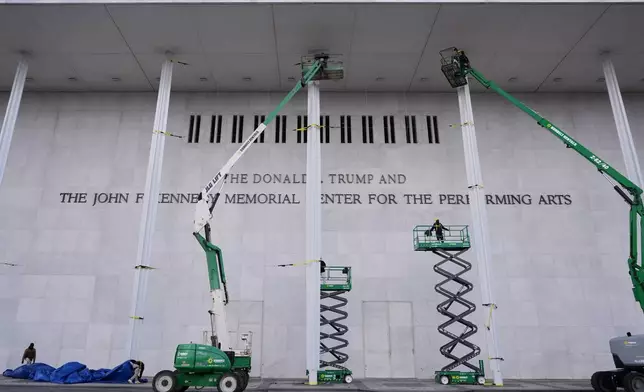 New signage, The Donald J. Trump and The John F. Kennedy Memorial Center for the Performing Arts, is unveiled on the Kennedy Center, Friday, Dec. 19, 2025, in Washington. (AP Photo/Jacquelyn Martin)