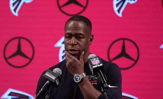 Atlanta Falcons head coach Raheem Morris speaks during a press conference after an NFL football game against the Seattle Seahawks, Sunday, Dec. 7, 2025, in Atlanta. (AP Photo/Mike Stewart)