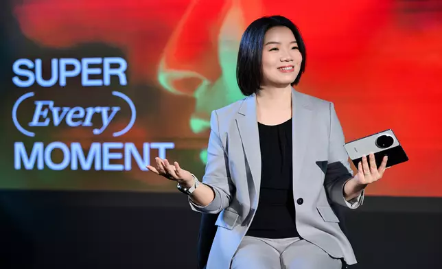 Ling Liu shares insights during the panel discussion.