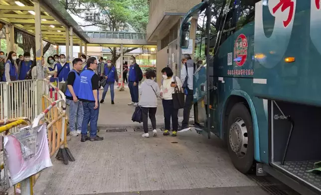 The residents of Wang Chi House in Wang Fuk Court have continued to return home to collect their belongings. Photo by Bastille Post