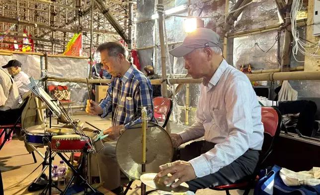 The instrumental performers behind the stage, Photo by Bastille Post