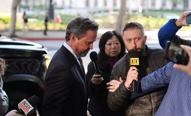Alan Jackson, the attorney for Nick Reiner, arrives in court for Reiner's arraignment on murder charges for the deaths of Rob and Michele Reiner Wednesday, Jan. 7, 2026, in Los Angeles. (AP Photo/Damian Dovarganes)