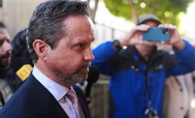 Alan Jackson, the attorney for Nick Reiner, arrives in court for Reiner's arraignment on murder charges for the deaths of Rob and Michele Reiner Wednesday, Jan. 7, 2026, in Los Angeles. (AP Photo/Damian Dovarganes)