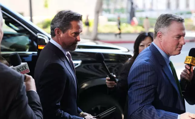 Alan Jackson, the attorney for Nick Reiner, arrives in court for Reiner's arraignment on murder charges for the deaths of Rob and Michele Reiner Wednesday, Jan. 7, 2026, in Los Angeles. (AP Photo/Damian Dovarganes)