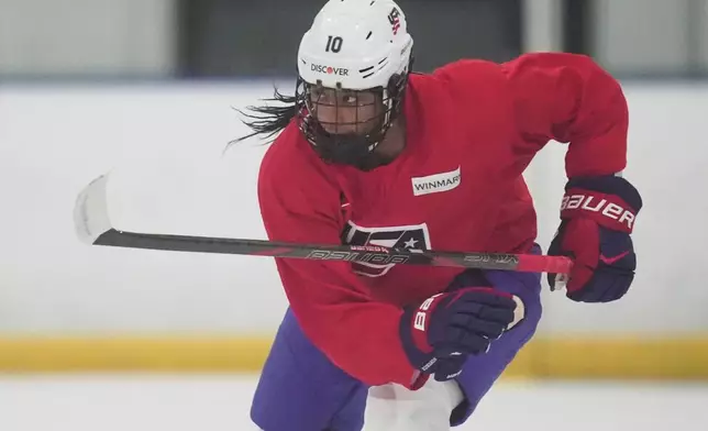 Laila Edwards, the first Black woman to suit up for Team USA women's Olympic hockey, participates in a practice, in a rink where she played youth hockey in the past, in Strongsville, Ohio, Tuesday, Nov. 4, 2025. (AP Photo/Sue Ogrocki)