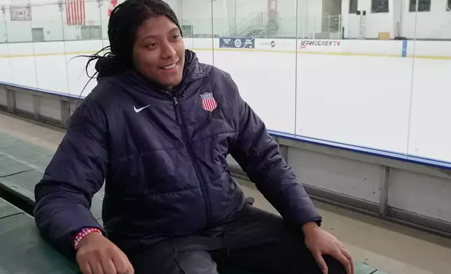Laila Edwards, the first Black woman to suit up for Team USA women's Olympic hockey, is pictured during an interview following practice in a rink where she played youth hockey in the past, in Strongsville, Ohio, Tuesday, Nov. 4, 2025. (AP Photo/Sue Ogrocki)