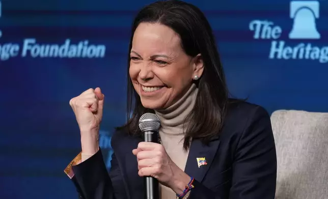 Venezuelan opposition leader Maria Corina Machado speaks at the Heritage Foundation, an influential conservative think tank, a day after meeting with President Donald Trump and members of Congress, on Capitol Hill in Washington, Friday, Jan. 16, 2026. (AP Photo/J. Scott Applewhite)