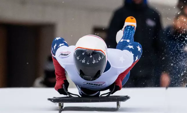 Kelly Curtis of the U.S. competes in the Women's Skeleton World Cup in St. Moritz, Switzerland, Friday, Jan. 9, 2026. (Mayk Wendt/Keystone via AP)