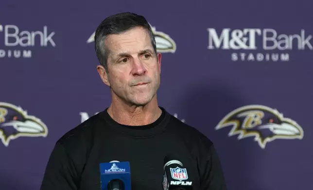 Baltimore Ravens head coach John Harbaugh speaks at a news conference after an NFL football game against the New England Patriots, Sunday, Dec. 21, 2025, in Baltimore. (AP Photo/Nick Wass)