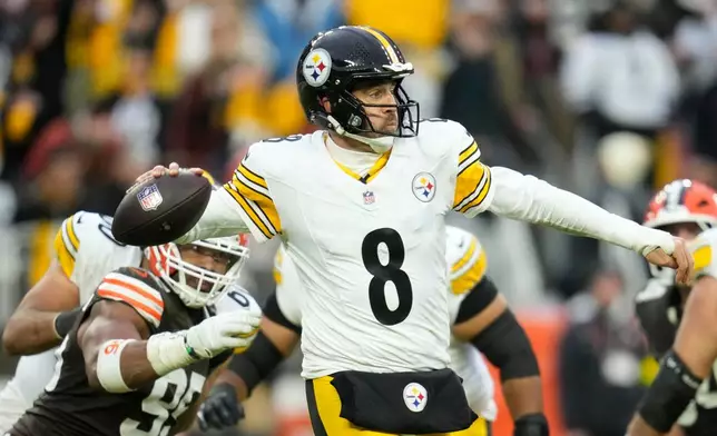 Pittsburgh Steelers quarterback Aaron Rodgers (8) throws a pass during the second half of an NFL football game against the Cleveland Browns, Sunday, Dec. 28, 2025, in Cleveland. (AP Photo/Sue Ogrocki)