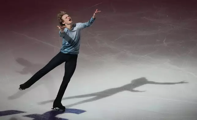 Ilia Malinin skates during the "Making Team USA" performance at the U.S. Figure Skating Championships, Sunday, Jan. 11, 2026, in St. Louis. (AP Photo/Jeff Roberson)
