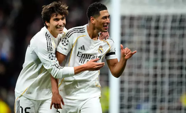 Real Madrid's Jude Bellingham celebrates his side's sixth goal during the Champions League opening phase soccer match between Real Madrid and Monaco in Madrid on Tuesday, Jan. 20, 2026. (AP Photo/Jose Breton)