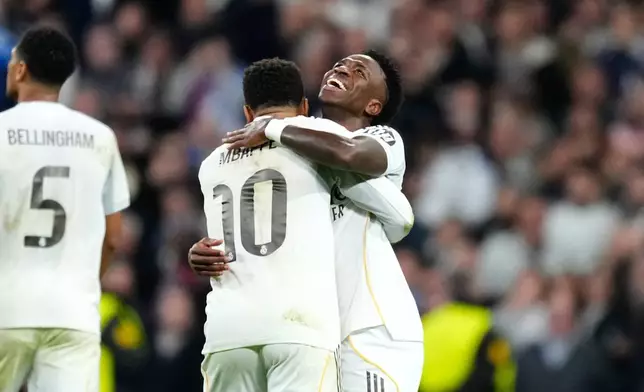 Real Madrid's Vinicius Junior celebrates his side's fifth goal during the Champions League opening phase soccer match between Real Madrid and Monaco in Madrid on Tuesday, Jan. 20, 2026. (AP Photo/Jose Breton)
