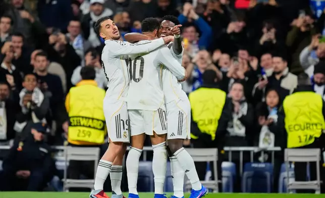 Real Madrid's Vinicius Junior celebrates his side's fifth goal during the Champions League opening phase soccer match between Real Madrid and Monaco in Madrid on Tuesday, Jan. 20, 2026. (AP Photo/Jose Breton)