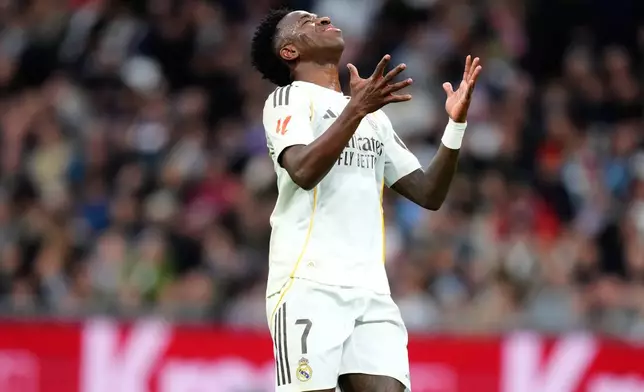 Real Madrid's Vinicius Junior reacts during the Spanish La Liga soccer match between Real Madrid and Levante in Madrid, Spain, Saturday, Jan. 17, 2026. (AP Photo/Jose Breton)