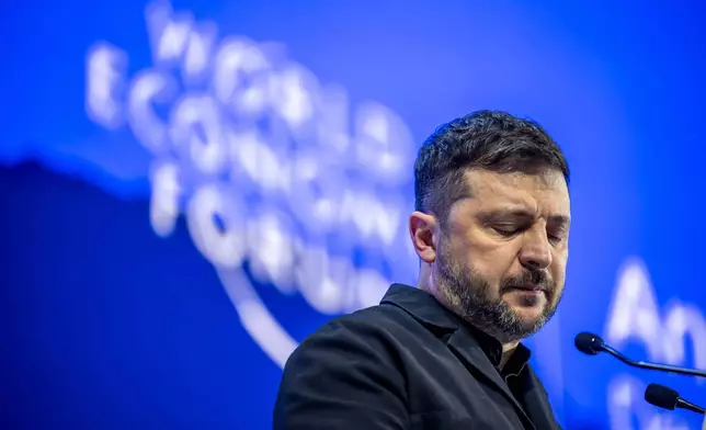 Ukraine's President Volodymyr Zelenskyy pauses as he delivers a speech at the Annual Meeting of the World Economic Forum in Davos, Switzerland, Thursday, Jan. 22, 2026. (Gian Ehrenzeller/Keystone via AP)