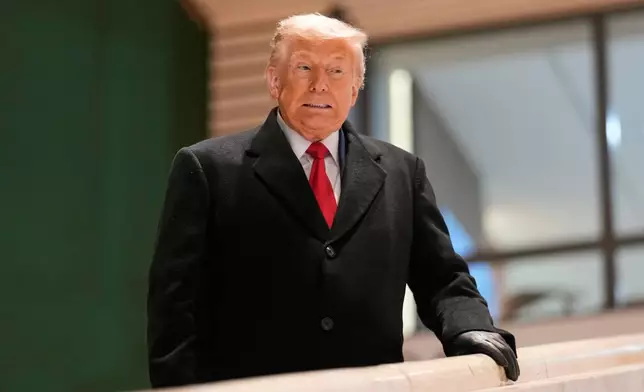 President Donald Trump reacts after a meeting during the Annual Meeting of the World Economic Forum in Davos, Switzerland, Wednesday, Jan. 21, 2026. (AP Photo/Markus Schreiber)