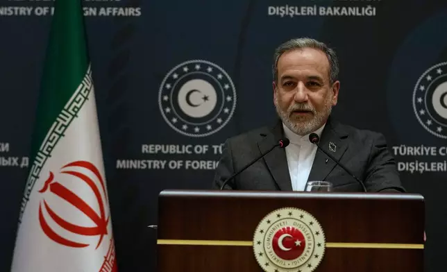 Iranian Foreign Minister Abbas Araghchi speaks to journalists during a joint press conference with his Turkish counterpart Hakan Fidan in Istanbul, Turkey, Friday, Jan. 30, 2026. (AP Photo/Khalil Hamra)